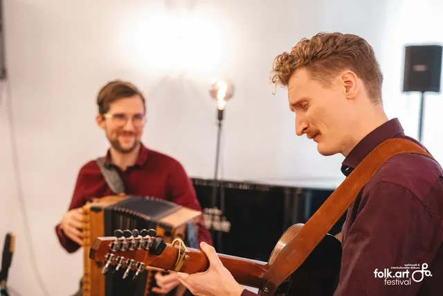 Press photo: Jonny and Timmy playing on stage at folkArt Festival Graz